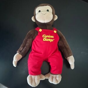 Curious George with Red Overalls.